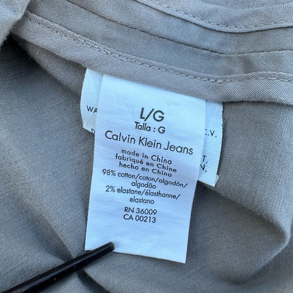 Calvin Klein jeans sleeveless dress with belt size L
Pit to pit: 17”
Length: 37” - Picture 7 of 8